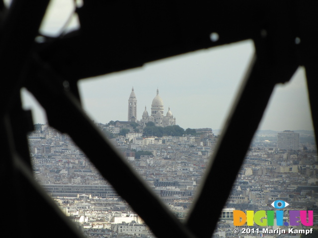 SX18461 View of Basilique du Sacre Coeur de Montmartre through structure of Eiffel tower